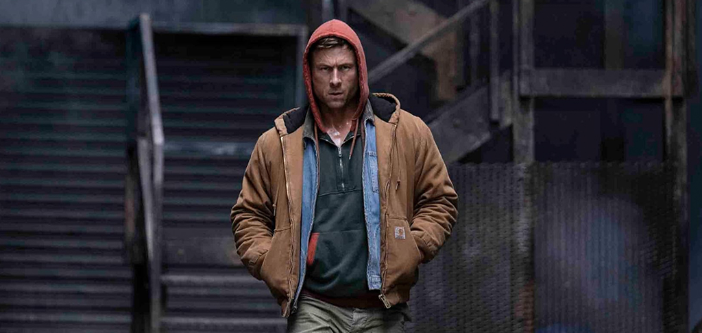 The Running Man Review: Powell’s a pleb in a Carhartt jacket